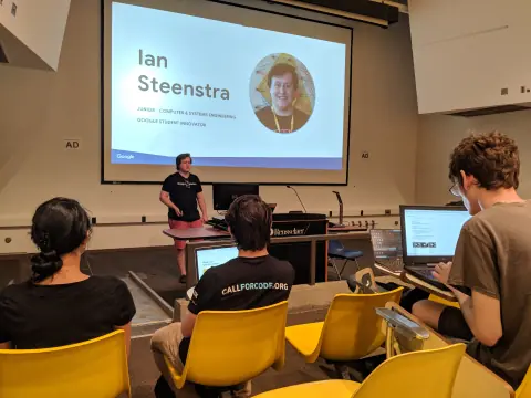 Speaker below a slide reading Ian Steenstra, Junior, Computer and Systems Engineering, Google Student Innovator